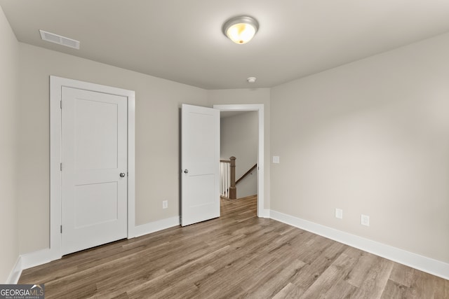 unfurnished bedroom featuring light hardwood / wood-style floors