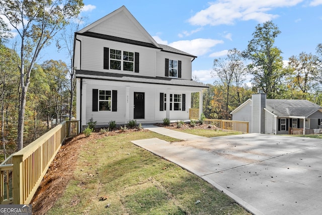 view of front facade featuring a front yard