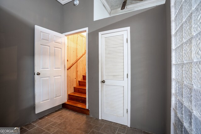 stairway with crown molding