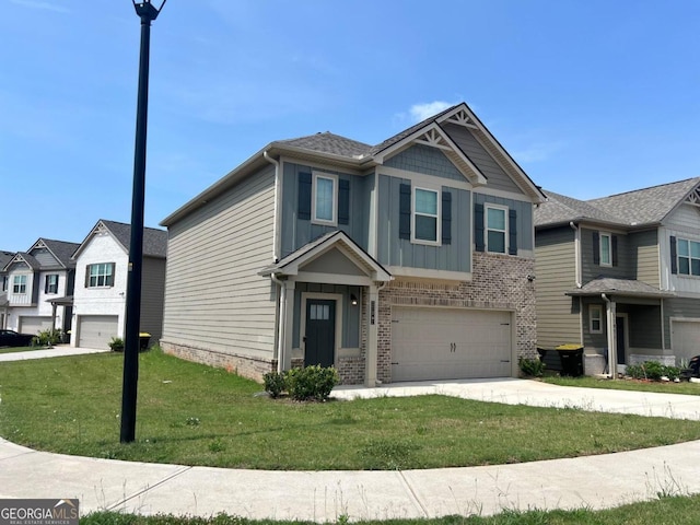 view of front facade featuring a front yard and a garage