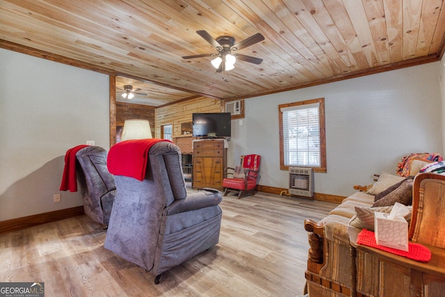 living room with wooden walls, light hardwood / wood-style flooring, ceiling fan, wood ceiling, and heating unit