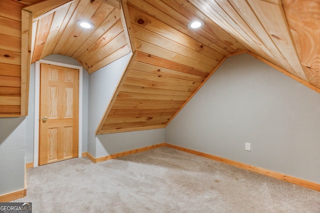 bonus room featuring light colored carpet, wooden ceiling, and lofted ceiling