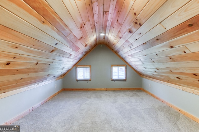 bonus room with light colored carpet, wood ceiling, and vaulted ceiling