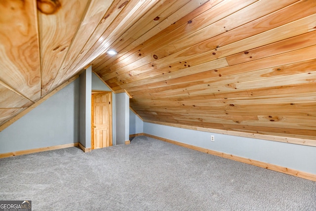 bonus room with carpet flooring, wooden ceiling, and vaulted ceiling