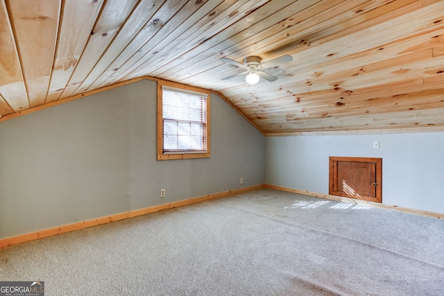 bonus room featuring carpet flooring, ceiling fan, wooden ceiling, and vaulted ceiling