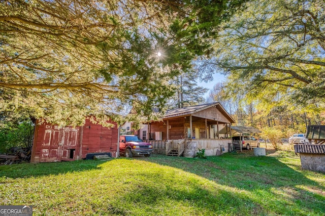 exterior space featuring a yard