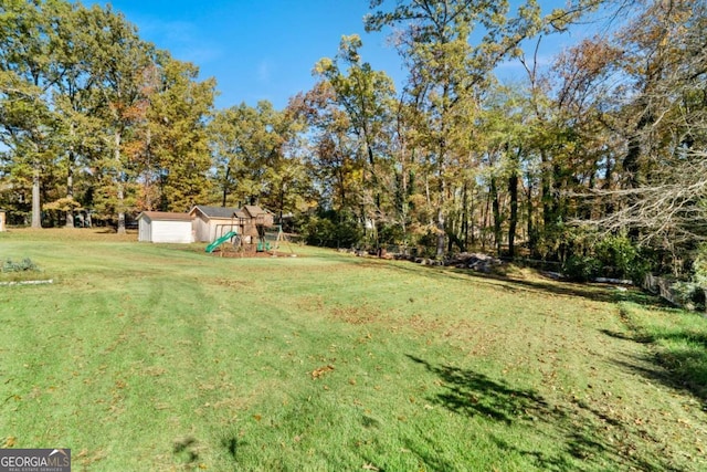 view of yard with a playground