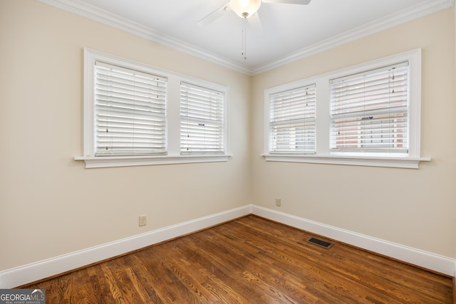 unfurnished room featuring hardwood / wood-style flooring, ceiling fan, and ornamental molding