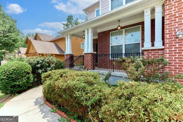 doorway to property with a porch