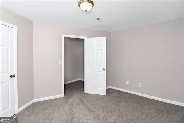 unfurnished bedroom featuring carpet floors