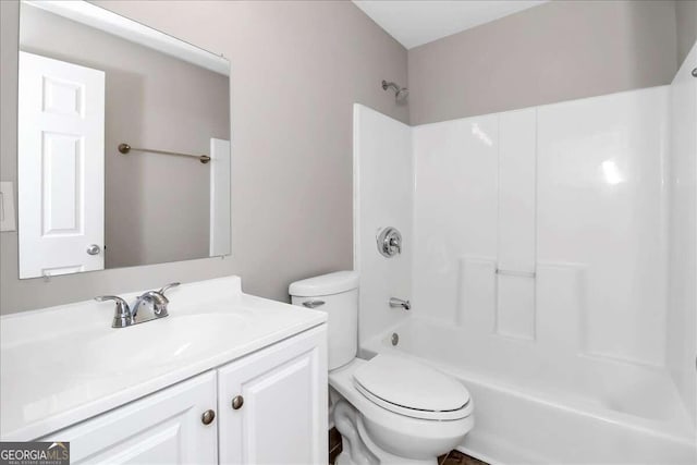 full bathroom featuring vanity, toilet, and shower / washtub combination