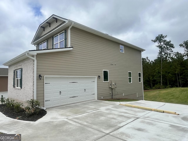 209 Shoreline Way Lot A19, Plan, Macon, GA 31220 - view of side of home featuring a garage and concrete driveway