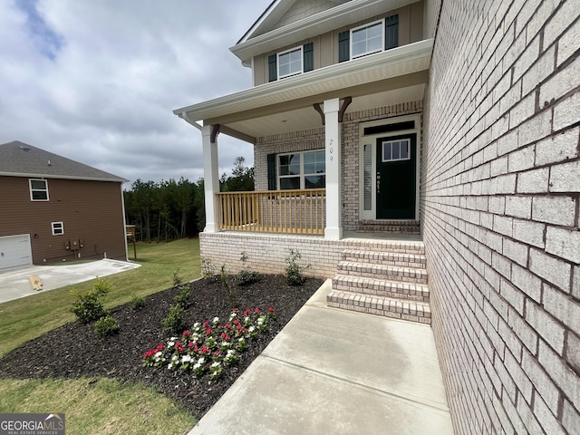 209 Shoreline Way Lot A19, Plan, Macon, GA 31220 - entrance to property with covered porch, brick siding, and a lawn