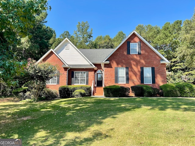 view of front of property with a front yard