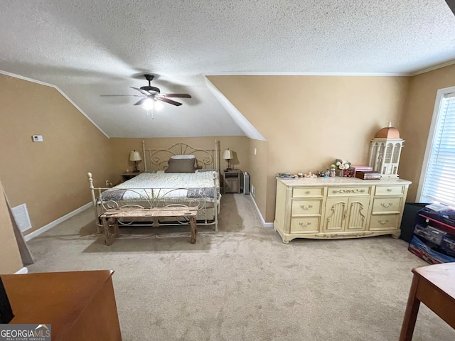 carpeted bedroom featuring a textured ceiling, ceiling fan, and lofted ceiling