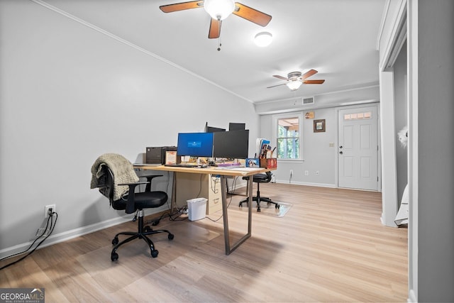 office with ceiling fan, light wood-type flooring, and ornamental molding