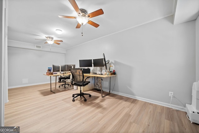 office space with hardwood / wood-style flooring, ceiling fan, and ornamental molding