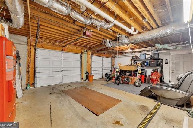 garage featuring a garage door opener