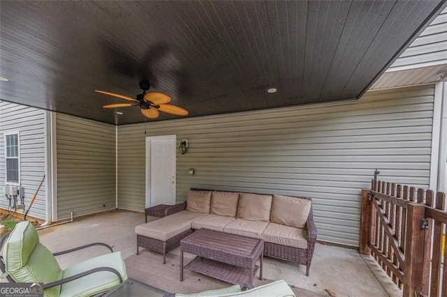 view of patio featuring outdoor lounge area and ceiling fan