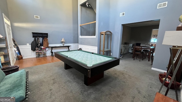 playroom with pool table, carpet flooring, and a high ceiling