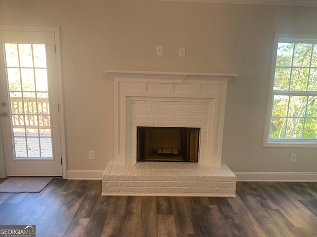 interior details with hardwood / wood-style flooring and a fireplace