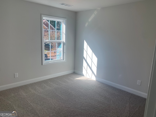 view of carpeted spare room