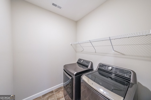 laundry area featuring independent washer and dryer