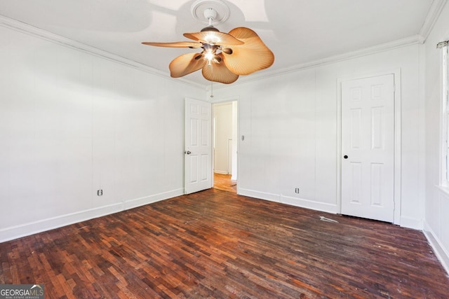 unfurnished bedroom with ceiling fan, dark hardwood / wood-style flooring, and ornamental molding