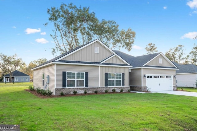 craftsman-style house featuring a garage and a front lawn