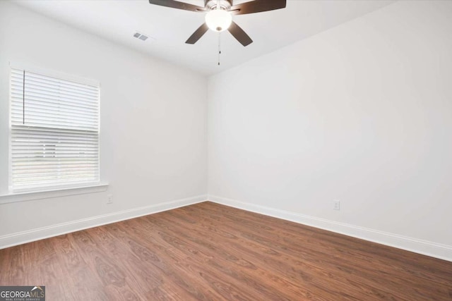 spare room featuring ceiling fan and wood-type flooring