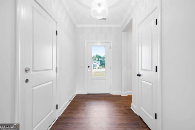 doorway to outside featuring crown molding and dark hardwood / wood-style flooring