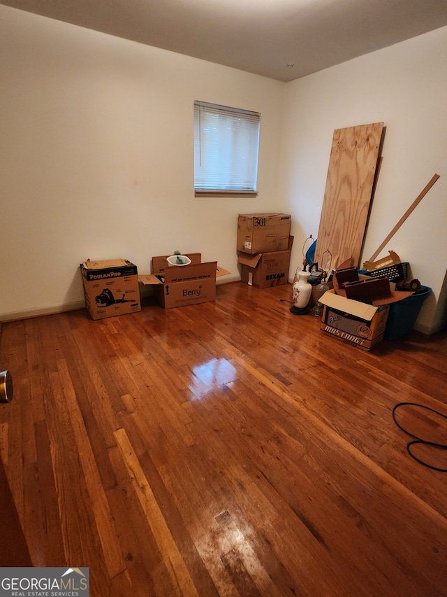 misc room with wood-type flooring