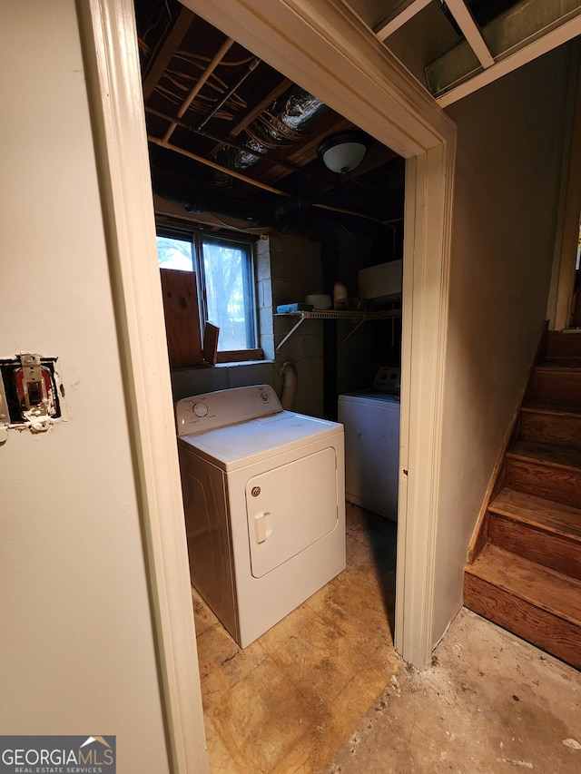 laundry area with washer and clothes dryer