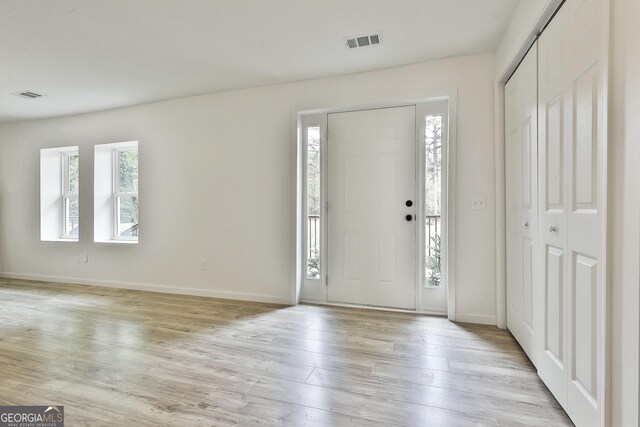 foyer entrance featuring light wood-type flooring