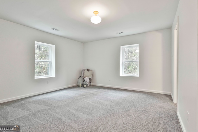 view of carpeted spare room