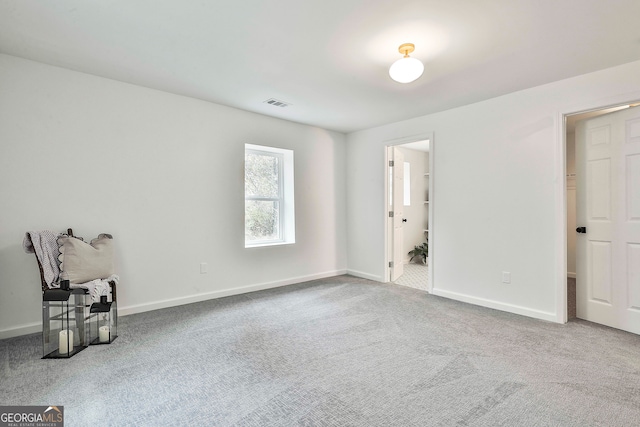 unfurnished bedroom with carpet flooring