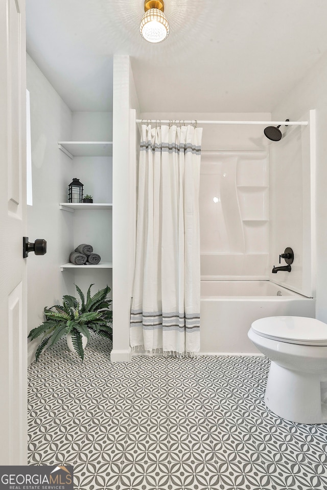 bathroom with toilet and shower / bathtub combination with curtain