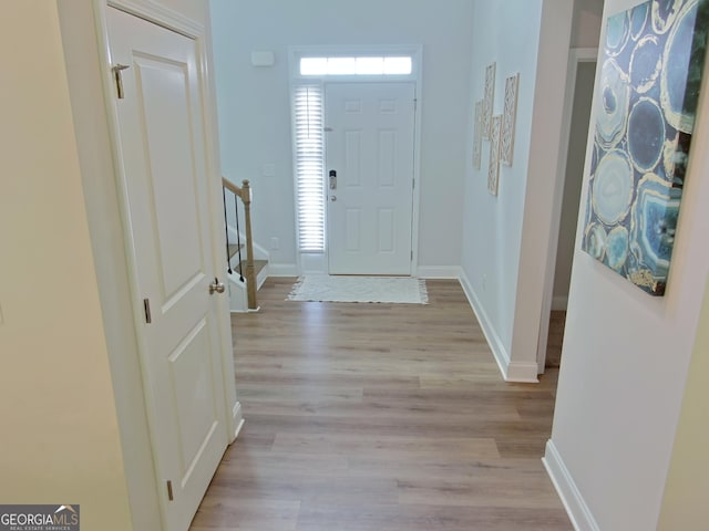 entryway with light wood-type flooring