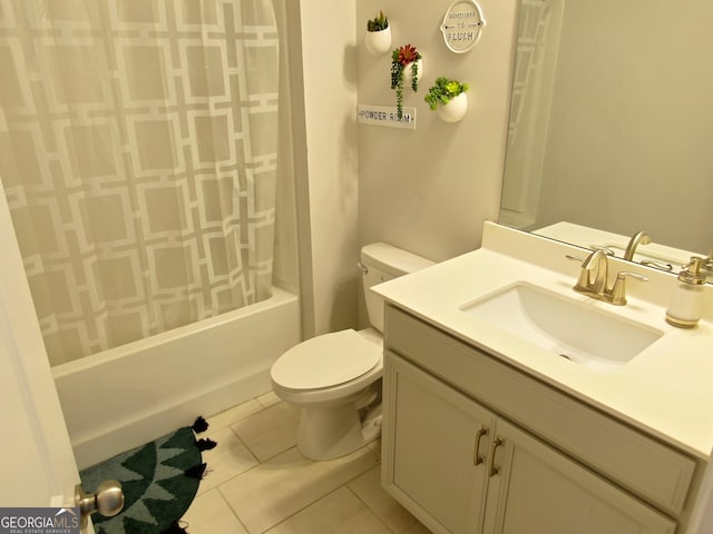 full bathroom featuring toilet, vanity, tile patterned floors, and shower / bath combination with curtain