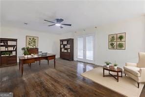 office featuring dark wood-type flooring and ceiling fan