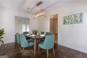 dining room featuring dark hardwood / wood-style flooring