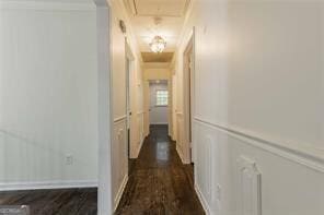 corridor featuring dark hardwood / wood-style flooring