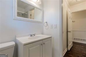 bathroom with vanity and toilet