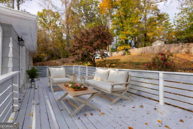 deck with an outdoor hangout area