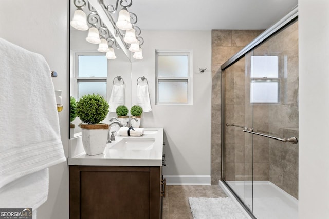 18 Watson Dr, Newnan, GA 30263 - full bath featuring double vanity, tiled shower, and baseboards