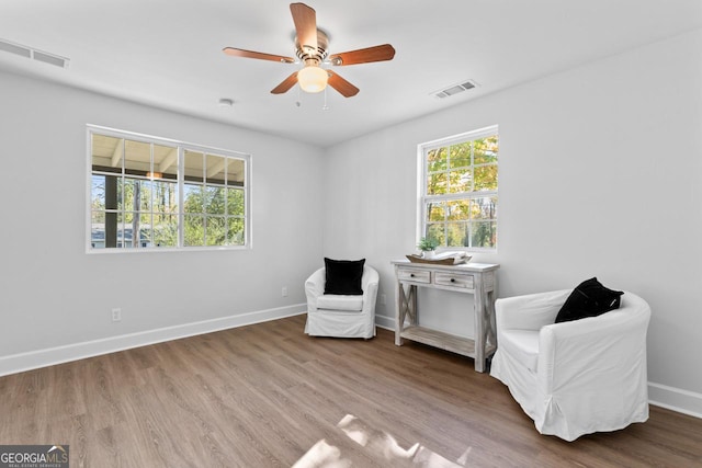 18 Watson Dr, Newnan, GA 30263 - sitting room with ceiling fan, baseboards, and wood finished floors