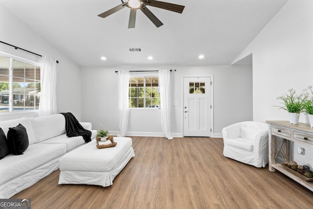 18 Watson Dr, Newnan, GA 30263 - living room featuring lofted ceiling, a ceiling fan, wood finished floors, recessed lighting, and baseboards