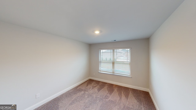 view of carpeted spare room