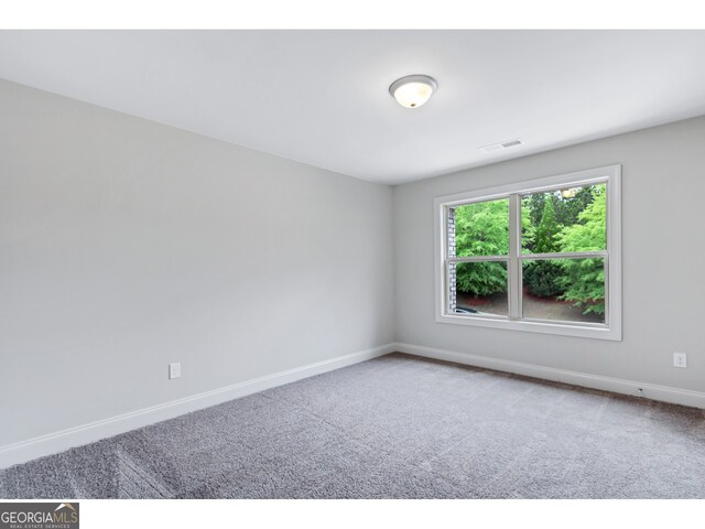 empty room with carpet floors