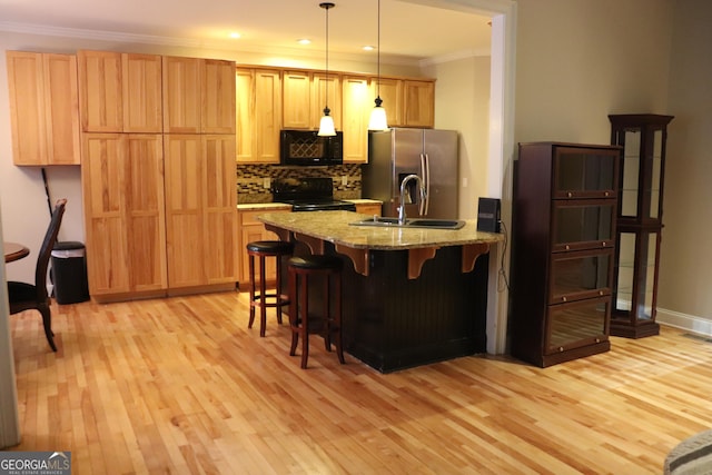 kitchen featuring range with electric stovetop, light stone countertops, decorative light fixtures, crown molding, and stainless steel fridge with ice dispenser